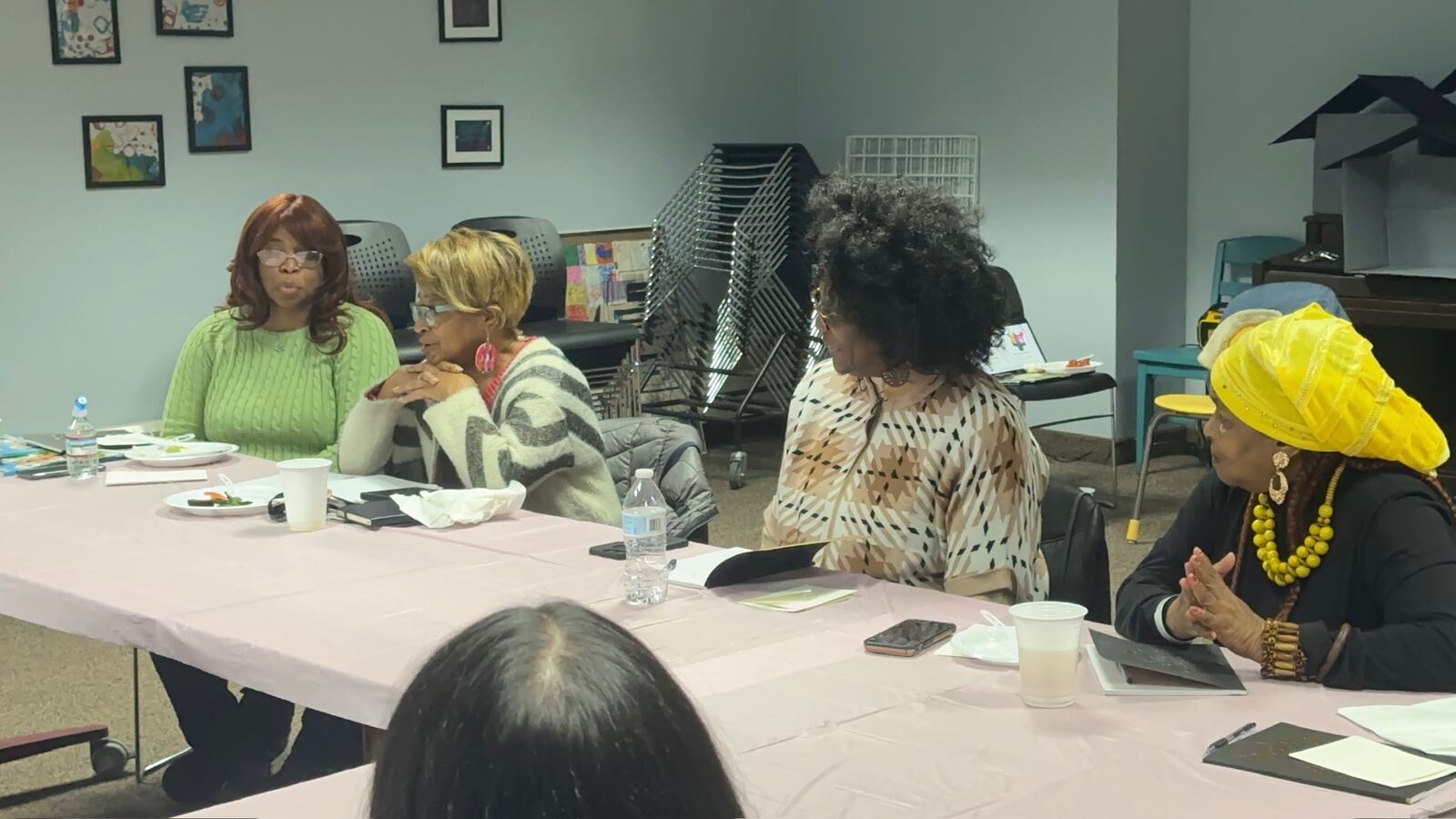 Mothers engaged in honest conversation at a Dream Moms gathering